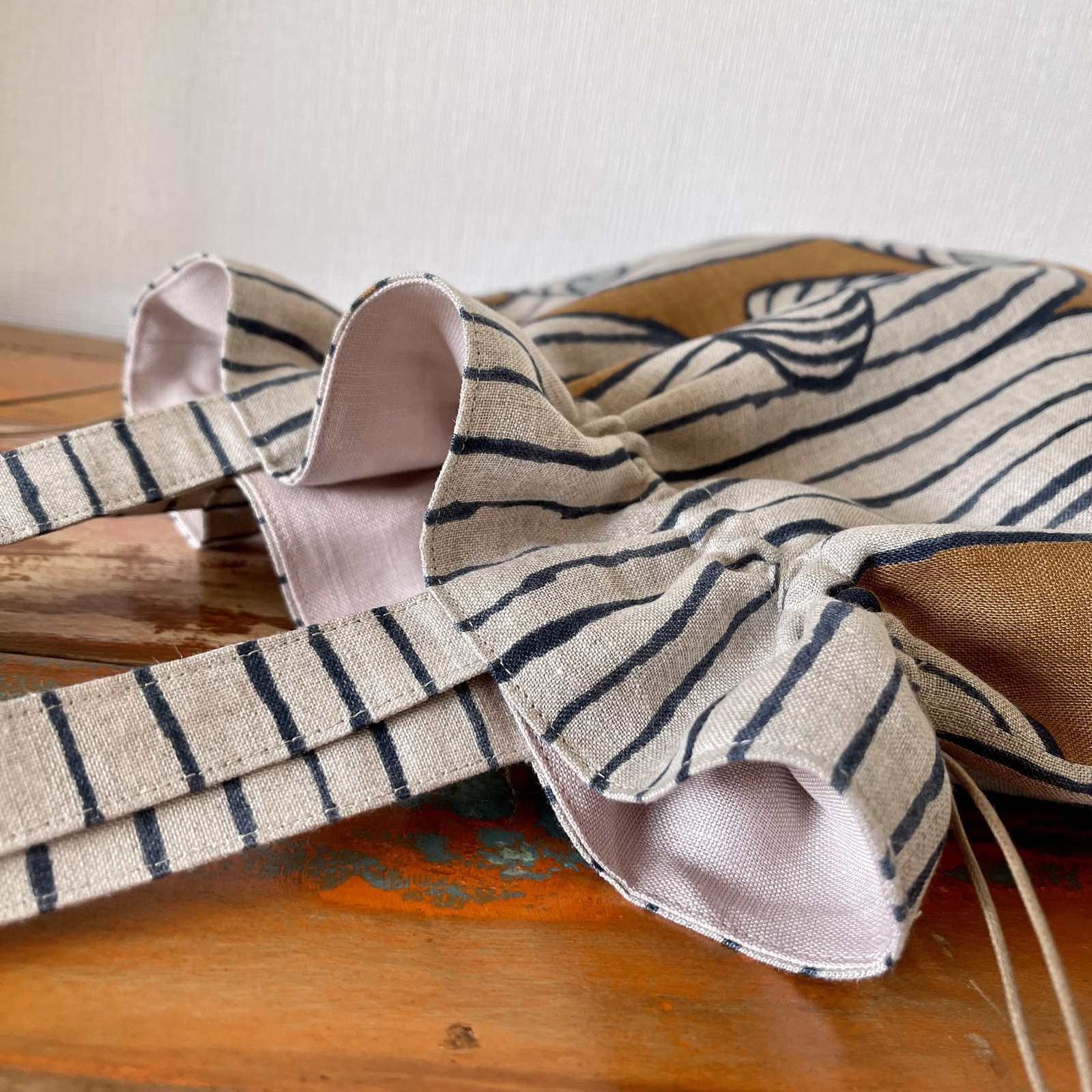 ミナペルホネン生地使用 ✳︎ swing 巾着バッグL - haruhitowork